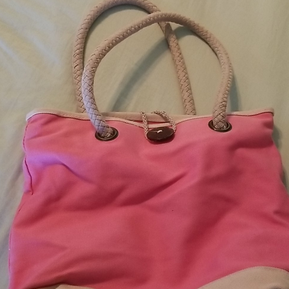 Coral color bag, braid handles